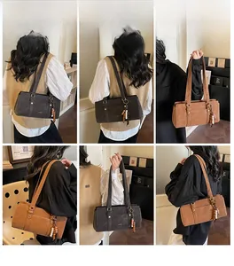 Detailed views of vintage large capacity shoulder bags in dark brown and caramel tones