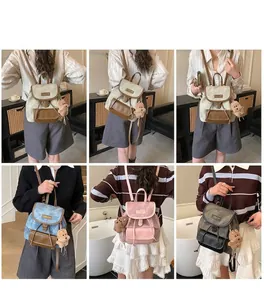 Lifestyle view of retro PU leather mini backpacks in multiple colors with bear charms