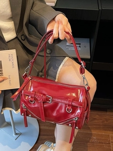 Chic red glossy cylindrical shoulder bag with punk metal zippers and buckles decoration