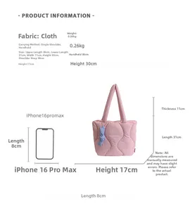 Pink quilted puffer tote bag size comparison with dimensions and iPhone scale