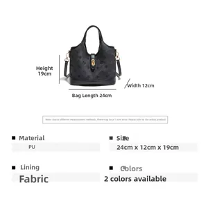 Detail view of black clover embossed bucket bag showing 24x12x19cm dimensions and texture