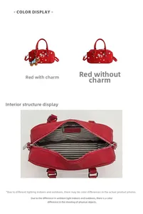 Detailed interior of red star baguette bag with striped lining and zipper pocket
