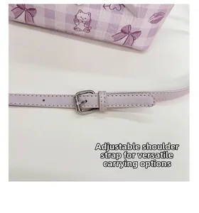 Detail of adjustable purple checkered shoulder strap with silver buckle on the tote bag