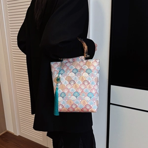 Chinese style bucket bag with colorful silk embroidery and natural bamboo handle