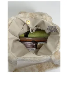 Spacious plush tote bag interior showing capacity for umbrella, phone and cosmetics