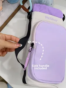 Close-up showing the side carry strap and zipper pocket of this nylon crossbody bag