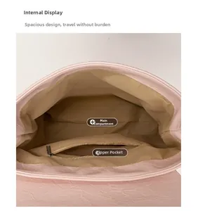 Macro shot of pink crocodile pattern backpack interior with smooth zipper pocket