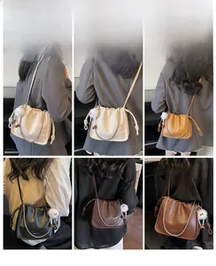 Multiple views showing pleated bucket bags with silver chains and plush charms in five colors