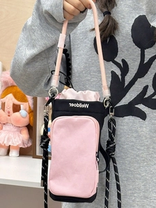 Fashionable black and pink crossbody mobile phone bag with adjustable cord strap