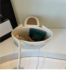 Top view of spacious interior of woven cotton rope beach tote bag with magnetic closure
