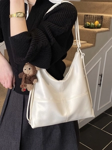 Minimalist off-white large capacity hobo tote bag with cross-stitch and plush bear charm