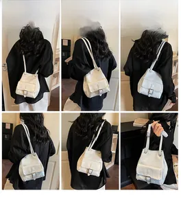 Detailed views of a white pebbled leather tote bag with braided edges and metal buckle