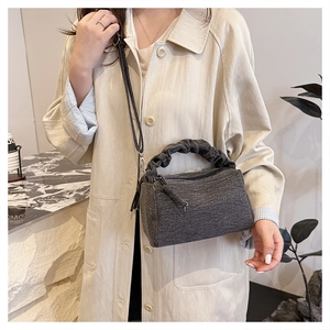 Pleated denim texture handbag in dark grey with cloud-shaped handle and adjustable strap