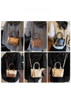 Detailed model views of vintage bucket bags in six colors with beaded tassel charms