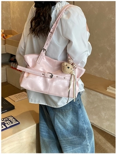 Pink glossy faux leather tote bag with metallic buckle and cute plush bear charm