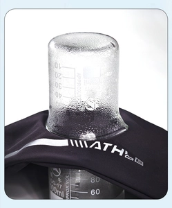 Macro shot showing high breathability test of black ATH fabric with water vapor detail