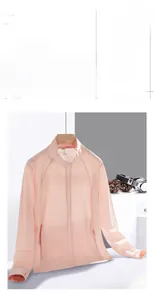Close-up of pink sun protection jacket with breathable mesh and hooded collar