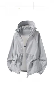 Detail view of light gray breathable sun protection jacket with drawstring hem