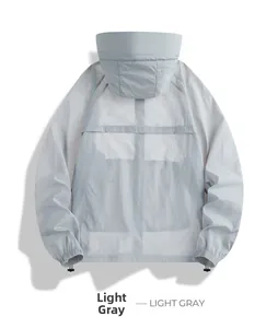 Détail d'une veste de protection solaire gris clair avec ourlet réglable et tissu respirant