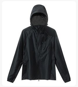 Close-up of lightweight black hooded sun protection jacket with water-resistant fabric