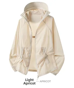 Detail of apricot thin sun protection jacket featuring breathable fabric and hood