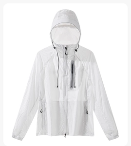 Detail of white hooded sun protection jacket featuring zipper pockets and elastic cuffs