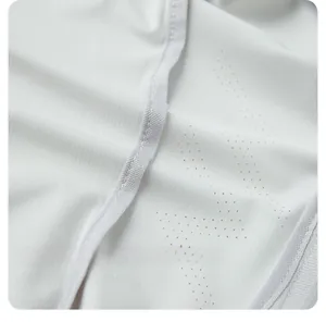 Detail of laser-cut breathable holes and premium inner hem sewing on sun protection clothing