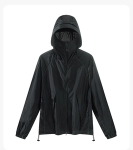 Detail of black sun protection hoodie with integrated face mask and wide brim hood
