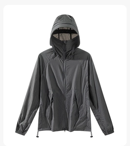 Detail of grey hooded sun protection jacket with high neck face shield and drawstring hem
