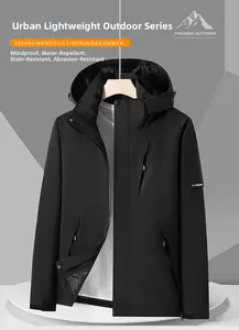 Close-up of black waterproof hiking jacket featuring chest zipper pocket and velcro cuffs