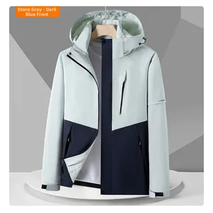 Outdoor hooded jacket in grey and dark blue with zipper pockets and adjustable cuffs