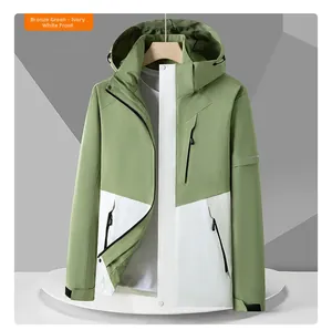 Detail of outdoor hooded jacket in bronze green and ivory white with velcro cuffs