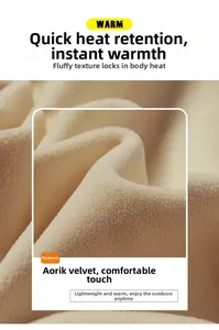Close-up of thick beige Olik Fleece fabric showing warm granular plush texture