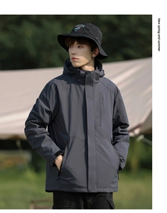Outdoor waterproof hooded jacket in dark grey with matching bucket hat and camping vibes