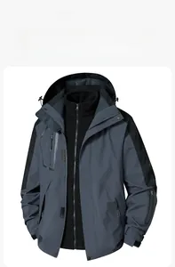 Detail of a windproof outdoor jacket featuring waterproof fabric and zippered chest pockets