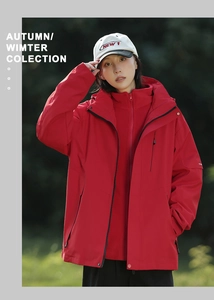 Detail view of red waterproof outdoor jacket with detachable hood and zipper pockets