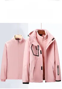 Pink 3-in-1 waterproof jacket detail with detachable fleece liner and outdoor shell