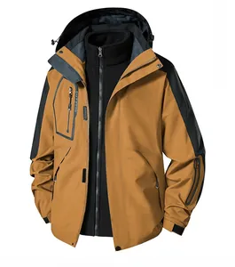 Detail of 3-in-1 outdoor jacket with caramel waterproof shell and black fleece liner