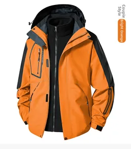 Detail of bright orange 3-in-1 outdoor jacket with windproof shell and fleece liner