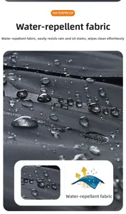 Detail of waterproof dark grey fabric with water droplets and stain-resistant coating