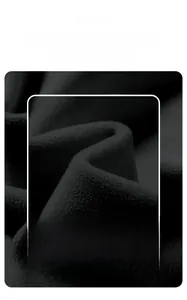 Detailed macro view of the thickened black polar fleece inner lining for thermal warmth