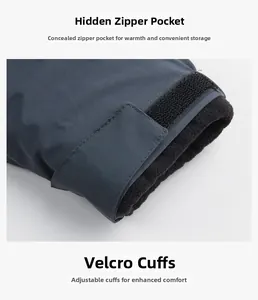 Detail of adjustable velcro cuffs and fleece lining on a winter outdoor hiking jacket