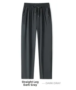 Detail of dark gray ice silk sports pants with elastic drawstring waist and zip pockets