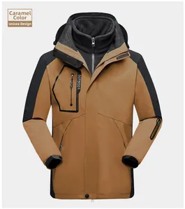Detailed view of caramel and black outdoor jacket with fleece lining and zipper pocket