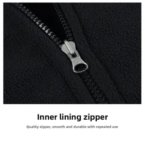 Close-up of the durable smooth silver metal zipper on black fleece inner liner jacket