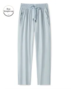 Détail du pantalon de sport bleu clair à séchage rapide avec cordon et poches zippées