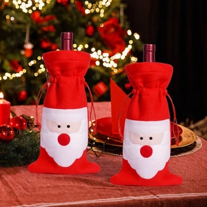 Detail of Santa Claus wine bottle gift bags with soft 3D beard and red drawstring closure