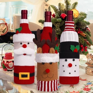 Detailed knit wine bottle covers featuring Santa, Reindeer, and Snowman Christmas designs