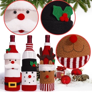 Detailed knit wine bottle covers featuring Santa, snowman, and reindeer designs
