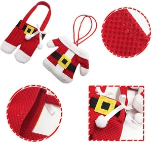 Macro detail of red waffle fabric textures and plush trim on Santa clothing decor